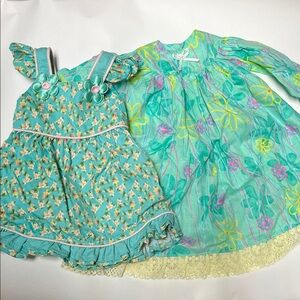 2 doll dresses (fits 18” dolls)
Floral pattern